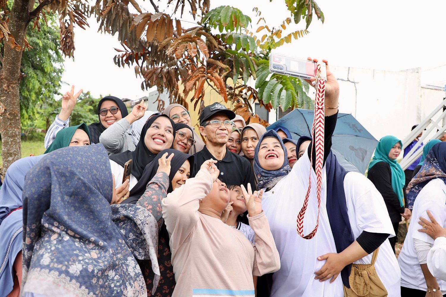 Meski Diguyur Hujan, Semangat Gema Batam ASRI di Belian Tetap Membara